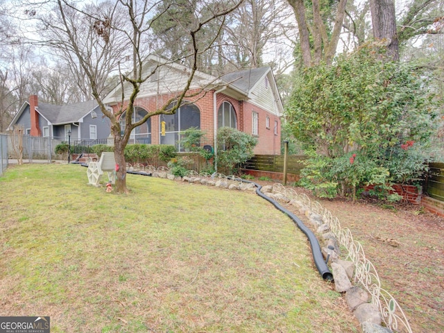 view of yard featuring fence