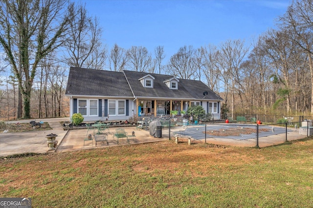 exterior space featuring fence, a patio, and a yard