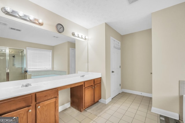 full bath featuring a stall shower, a garden tub, a sink, and double vanity