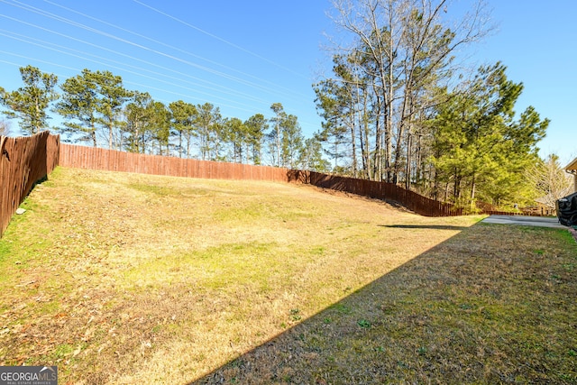 view of yard with fence