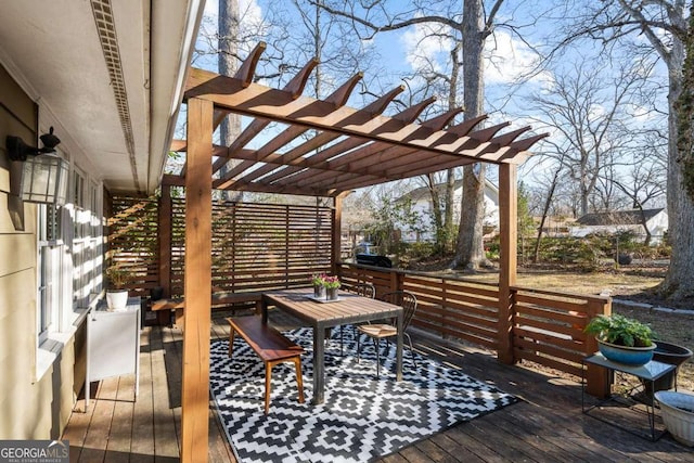 wooden terrace with a pergola