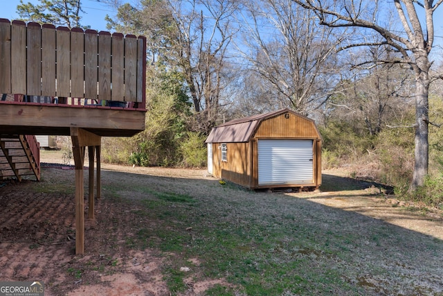 view of yard with an outdoor structure and a storage unit