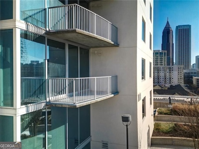 view of building exterior featuring a view of city