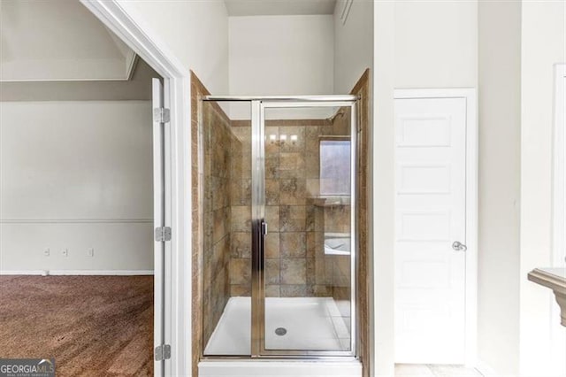 full bath featuring a shower stall