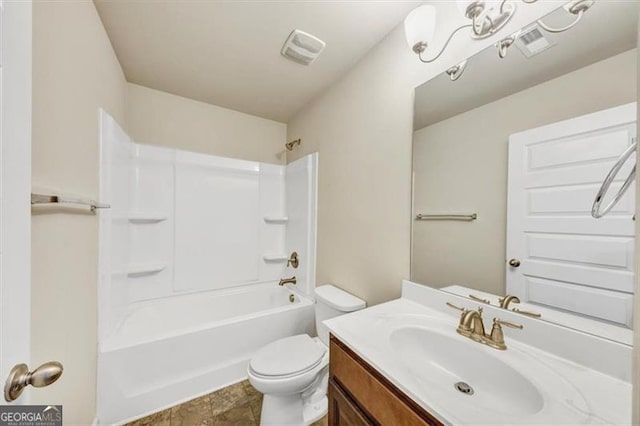 bathroom with visible vents, shower / bathing tub combination, vanity, and toilet