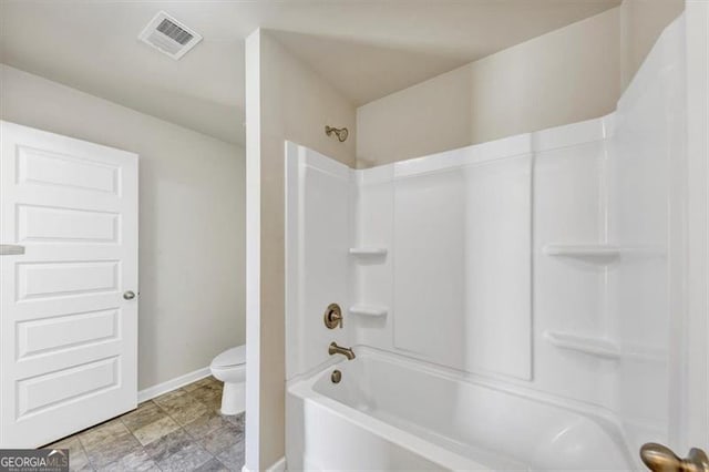 full bathroom with baseboards, visible vents, shower / bathing tub combination, and toilet