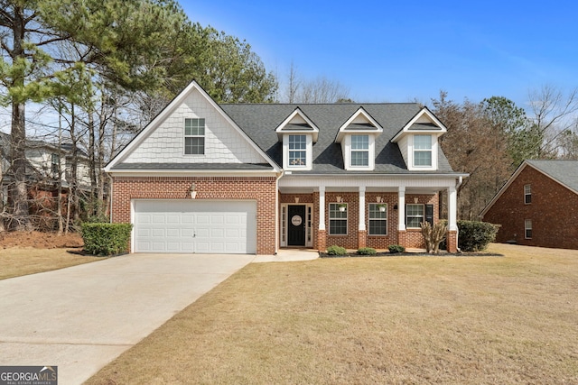 view of front facade featuring a garage, driveway, brick siding, and a front lawn