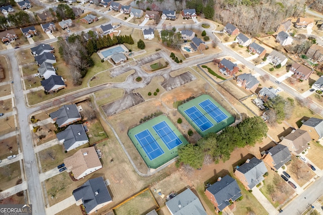 birds eye view of property with a residential view