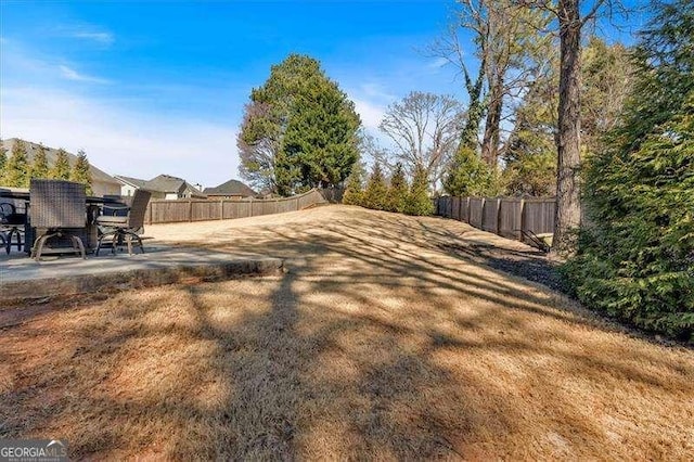 view of yard with fence