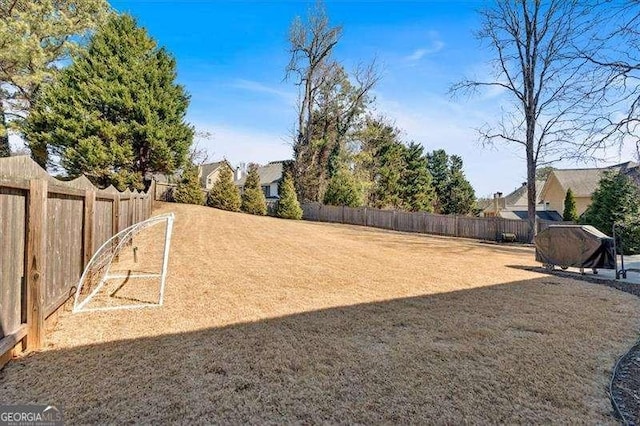 view of yard featuring fence