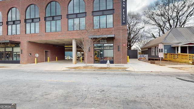 112 Rogers St Unit 409, Atlanta, GA 30317 - view of building exterior with concrete driveway