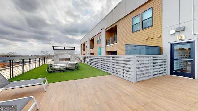 112 Rogers St Unit 409, Atlanta, GA 30317 - deck with a lawn, a fireplace, and fence