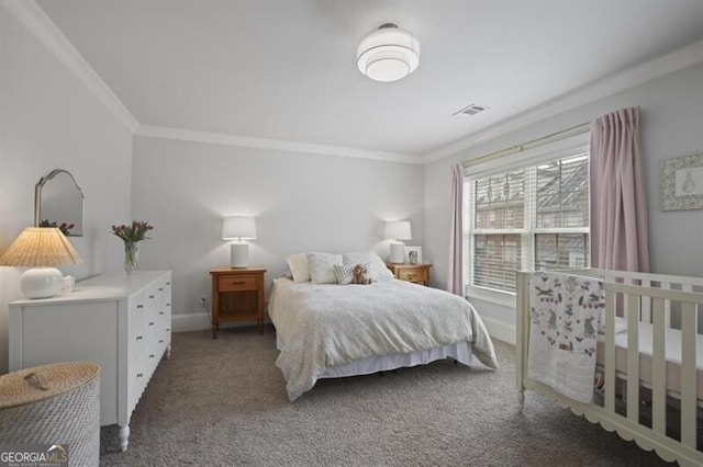 bedroom featuring baseboards, carpet floors, visible vents, and crown molding