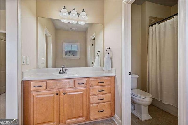 full bath featuring a shower with shower curtain, vanity, toilet, and tile patterned floors