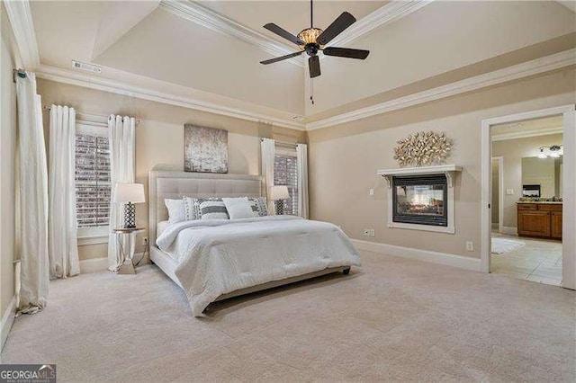 bedroom featuring carpet floors, crown molding, visible vents, a multi sided fireplace, and baseboards