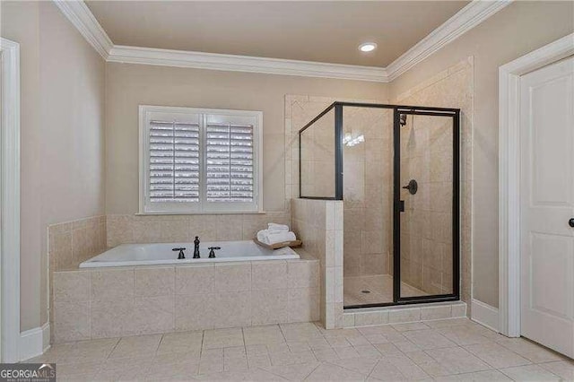 bathroom with ornamental molding, a stall shower, tile patterned floors, and a bath