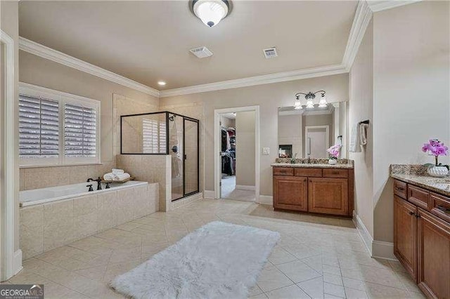 full bathroom featuring visible vents, vanity, ornamental molding, a bath, and a stall shower