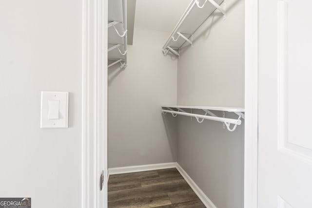 3481 Lakeside Dr NE Unit 2303, Atlanta, GA 30326 - walk in closet with dark wood-style floors