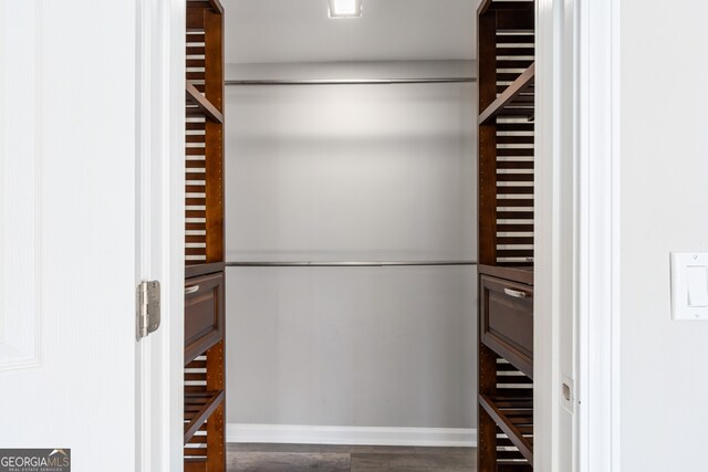 3481 Lakeside Dr NE Unit 2303, Atlanta, GA 30326 - walk in closet featuring wood finished floors