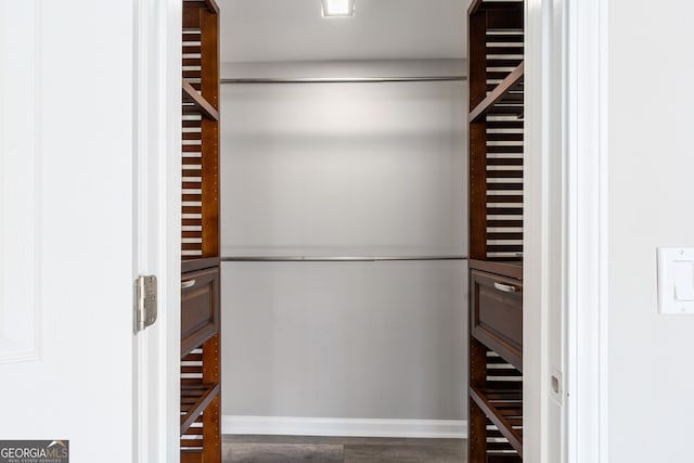 3481 Lakeside Dr NE Unit 2303, Atlanta, GA 30326 - spacious closet with wood finished floors