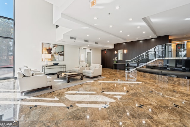 3481 Lakeside Dr NE Unit 2303, Atlanta, GA 30326 - living area featuring marble tiled flooring, stairway, and recessed lighting