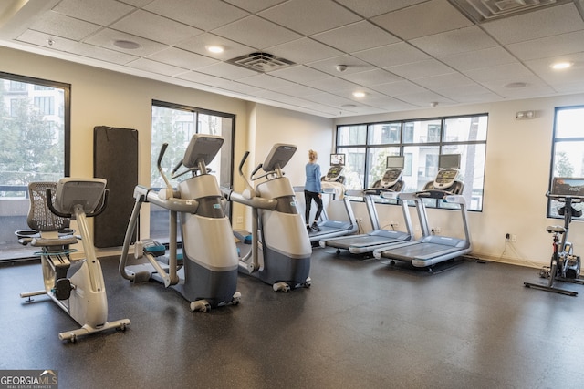 3481 Lakeside Dr NE Unit 2303, Atlanta, GA 30326 - gym with a drop ceiling, a healthy amount of sunlight, and visible vents