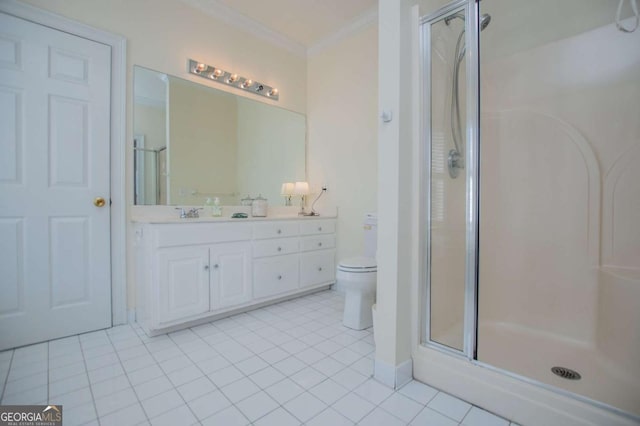 bathroom with double vanity, a stall shower, toilet, ornamental molding, and tile patterned floors