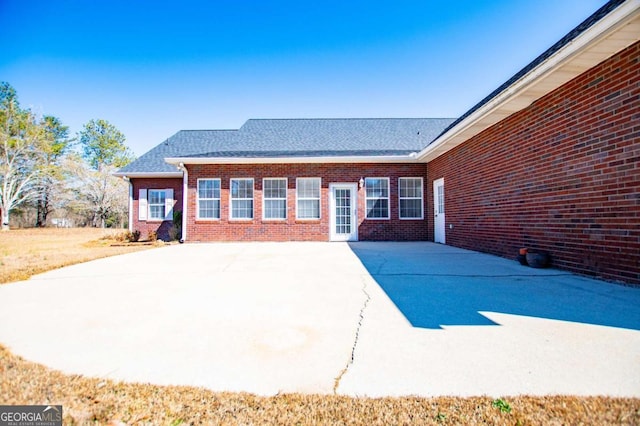 back of property with brick siding