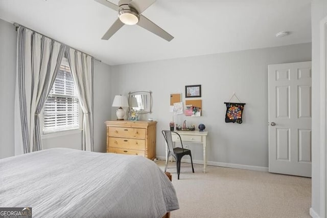 bedroom with carpet flooring, baseboards, and ceiling fan