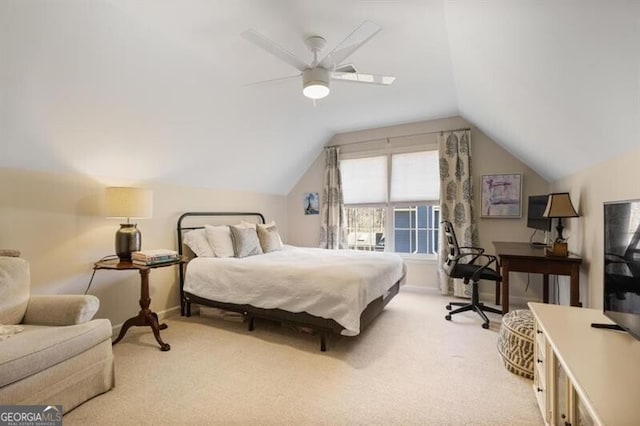 bedroom with baseboards, light carpet, lofted ceiling, and ceiling fan