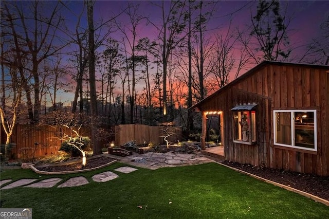 view of yard featuring a patio area and fence