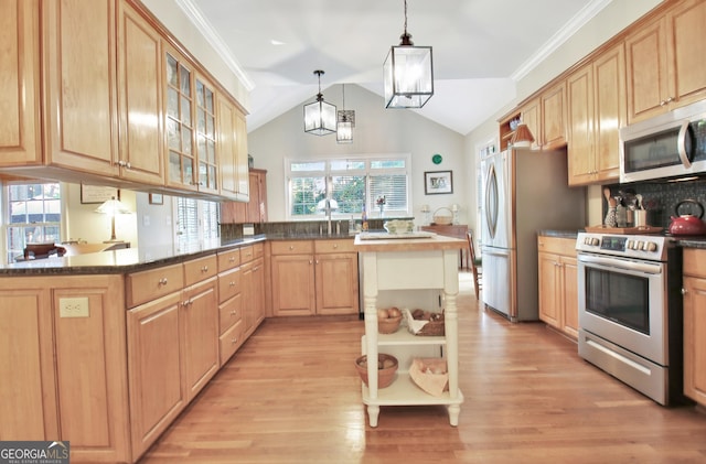 kitchen with glass insert cabinets, stainless steel appliances, light brown cabinets, open shelves, and a sink