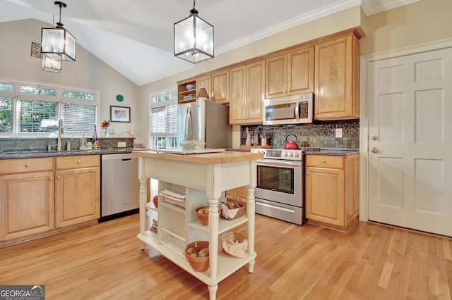 kitchen featuring stainless steel appliances, light brown cabinetry, a sink, and open shelves