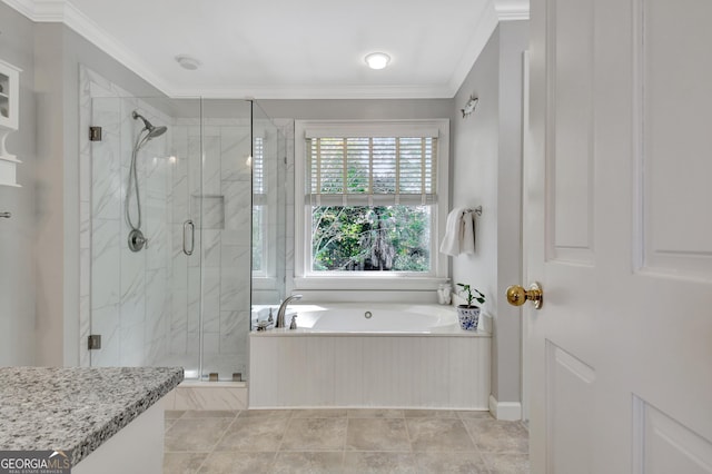 bathroom featuring ornamental molding, a shower stall, and a bath