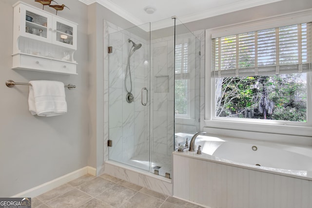 bathroom with ornamental molding, plenty of natural light, a marble finish shower, and a bath