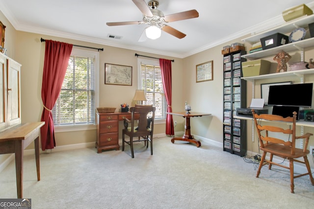 office area featuring a wealth of natural light, ornamental molding, carpet flooring, and visible vents