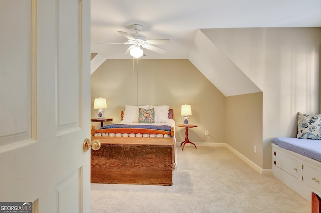 bedroom with ceiling fan, carpet, baseboards, and vaulted ceiling