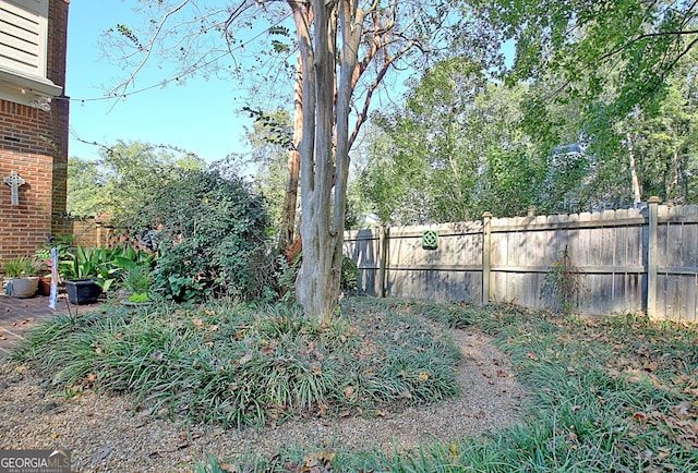 view of yard with fence