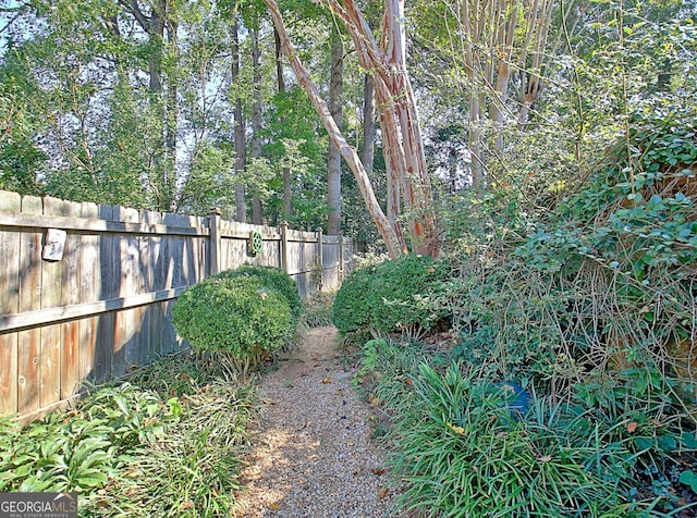 view of yard with fence