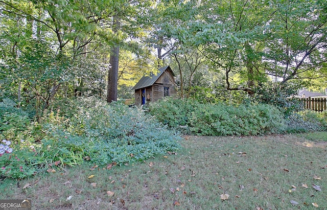 view of yard with fence