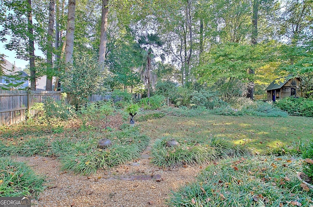 view of yard featuring fence