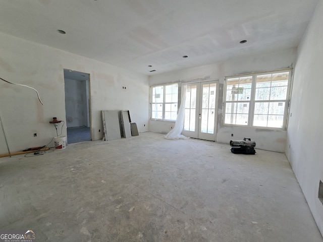 empty room featuring french doors