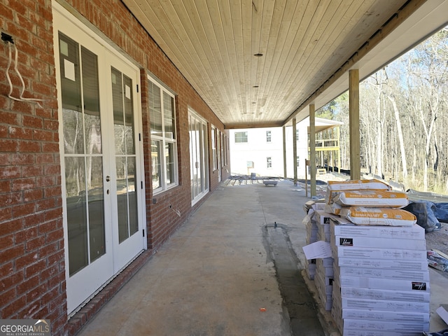 view of patio featuring french doors