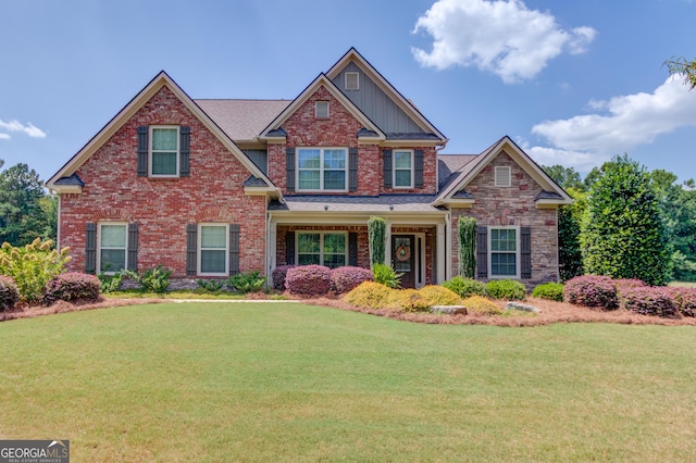 1433 Henderson Ridge Ln, Loganville, GA 30052 - craftsman-style house featuring brick siding and a front yard
