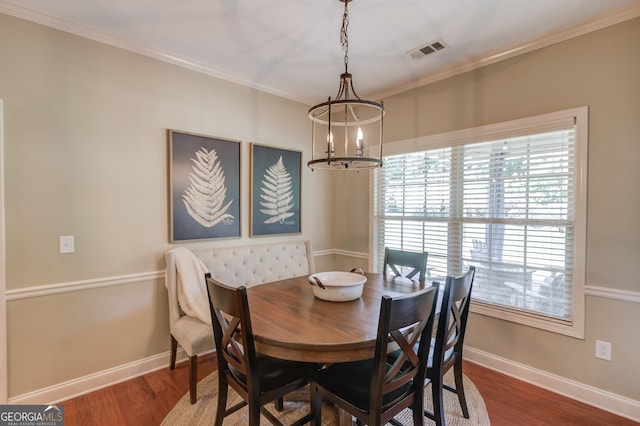 1433 Henderson Ridge Ln, Loganville, GA 30052 - dining space featuring baseboards, visible vents, and wood finished floors