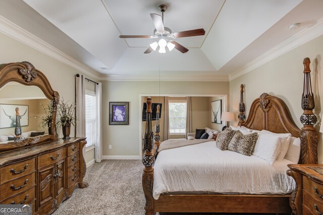 1433 Henderson Ridge Ln, Loganville, GA 30052 - bedroom featuring baseboards, a raised ceiling, a ceiling fan, light colored carpet, and ornamental molding