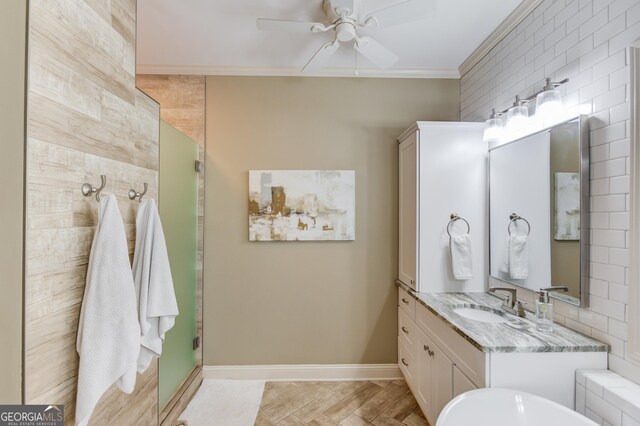 1433 Henderson Ridge Ln, Loganville, GA 30052 - full bathroom with ornamental molding, a ceiling fan, a shower stall, vanity, and baseboards