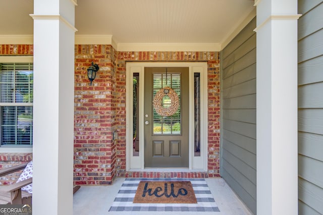 1433 Henderson Ridge Ln, Loganville, GA 30052 - entrance to property featuring covered porch and brick siding