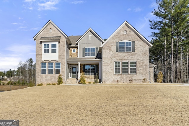 traditional home with brick siding and board and batten siding