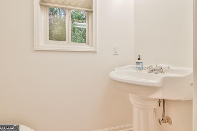 bathroom with baseboards